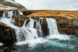 Close-up of the picturesque Kirkjufellsfoss waterfall near the famous Kirkjufell mountain on the north coast of the Snæfellsnes peninsula, near Grundarfjörður, Iceland