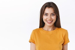 Close-up alluring happy smiling brunette woman in yellow t-shirt looking forward to exciting event, grinning joyfully express positivity and enthusiasm, glad take part interesting promo campaign