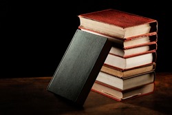 books stack wooden table jpg