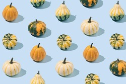 Seamless pattern with decorative pumpkins on a blue background. Autumn, fall, halloween concept. Isometric layout. Rectangle