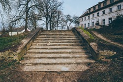 Park landscape. Stone paved stairs in park 