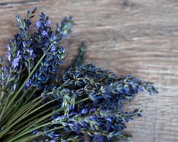 bunch of lavander on wooden background, selective focus. High quality photo