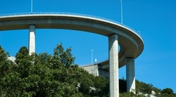 Bridge against the blue sky. Motorway flyover near Krk island in Croatia. Selective focus. High quality photo