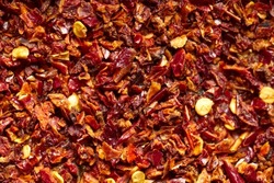 Dried red chilli peppers spice as a background, texture, pattern. High quality photo