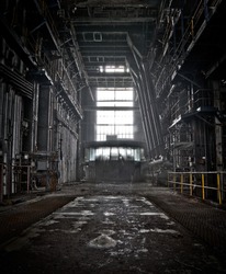 The interior of a machine hall at an abandoned industrial area