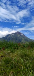 Mount Merapi (peak altitude 2,930 masl, as of 2010) is a volcano in the central part of Java Island and is one of the most active volcanoes in Indonesia.