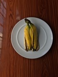 Banana Peels On White Plate