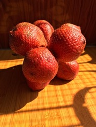 salak fruit (snake fruit) with sunlight shadows