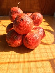 salak fruit (snake fruit) with sunlight shadows
