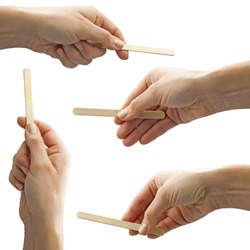 Set of isolated female hands holding empty ice cream stick