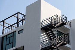 fire escape stair steel. black outdoor metal stair of building.