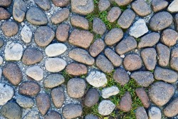 Pavement pebble pathway pattern texture background, the part of italian old style stone sidewalk