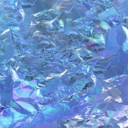 Frozen color combination on aluminium foil  background. Minimal abstract icy flat lay concept. Creative modern texture.