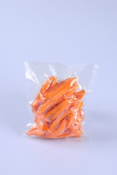 A bag of carrots in a transparent package