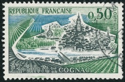 POLTAVA, UKRAINE -Desember 22 , 2021. Vintage stamp printed in France circa 1961 shows Cognac city