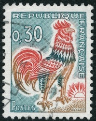 POLTAVA, UKRAINE -Desember 22 , 2021. Vintage stamp printed in France circa 1965 shows the Gallic Cock