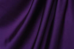 Dark purple silk fabric with drapery - background for design