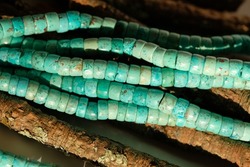 Natural stone. The trade name of this stone is Peruvian turquoise.