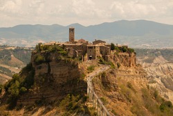 Civita di Bagnoregio, a typical medieval italian village, in a scenic tufa mountain's view.