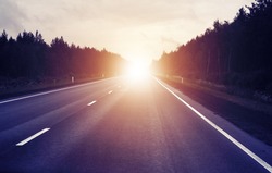 travel concept, sunrise on an empty road