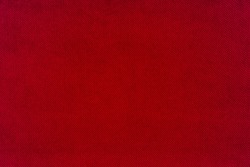 Red fabric background texture. Red cloth. Fabric surface for banner background. Top view.