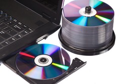 Closeup view of a modern high-end laptop computer with its CD/DVD optical drive open
