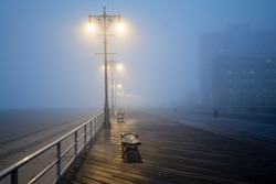 Street lights, foggy misty night, lamp post lanterns, deserted road in mist fog