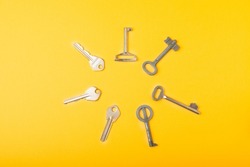 Keys decorative keys for clocks and caskets and doors with unique shapes and designs.Abstract background patterns and patterns.Flat lay.