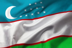 Satin texture of curved flag of Uzbekistan