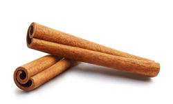 Two delicious cinnamon sticks, isolated on white background