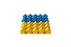 Figurines for board games isolated on white background. The color of the figurines symbolizes the colors of the flag of Ukraine, blue and yellow. The concept of support for the people of Ukraine.
