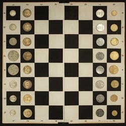 Unusual chess, where obsolete coins are used instead of pieces