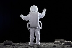 Creative astronaut back view. Welcome to space