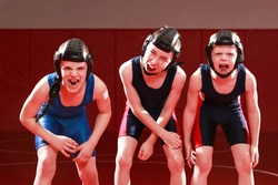 Three youth wrestlers