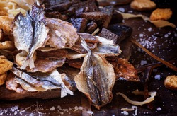 Dried fish to beer, selective focus
