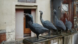 bronze geese with running water flowing from their mouths, Le Jarden du Tripot, Tripot's gardens, Honfleur, France                               
