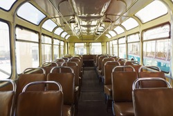 Old time bus cabin with old leather seats