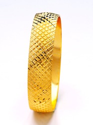 Gold bracelets isolated