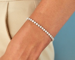 Diamond bracelet on young woman hand