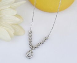 Diamond jewelry. Diamond necklace on background
