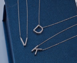 Diamond letter. Chain pendant. ten backgrounds