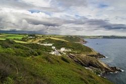 A view from the South West Coast Path from the cliffs above Portloe on the south coast of Cornwall