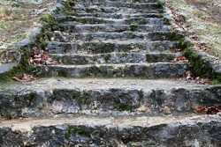 A closeup of an old stone stairs. Selective focus. High quality photo