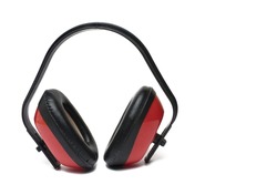 Close up of professional hearing protection with red ear capsules and black temple for work protection in noisy environment on white background earmuff