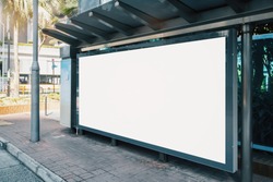 Side view of blank white horizontal billboard at bus stop. Commercial concept. Mock up 