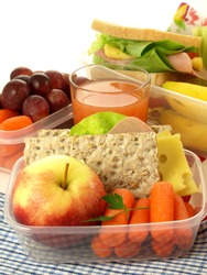 Lunch box and healthy food on isolated background