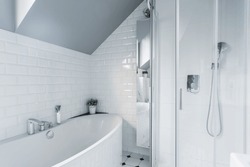 Exclusive white bathroom with bath and shower