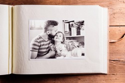 Fathers day composition. Photo album, black-and-white picture.