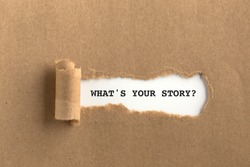 The text WHAT'S YOUR STORY? behind torn brown paper