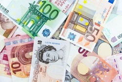 Many currency collections indicating inflation rate and hike in price
